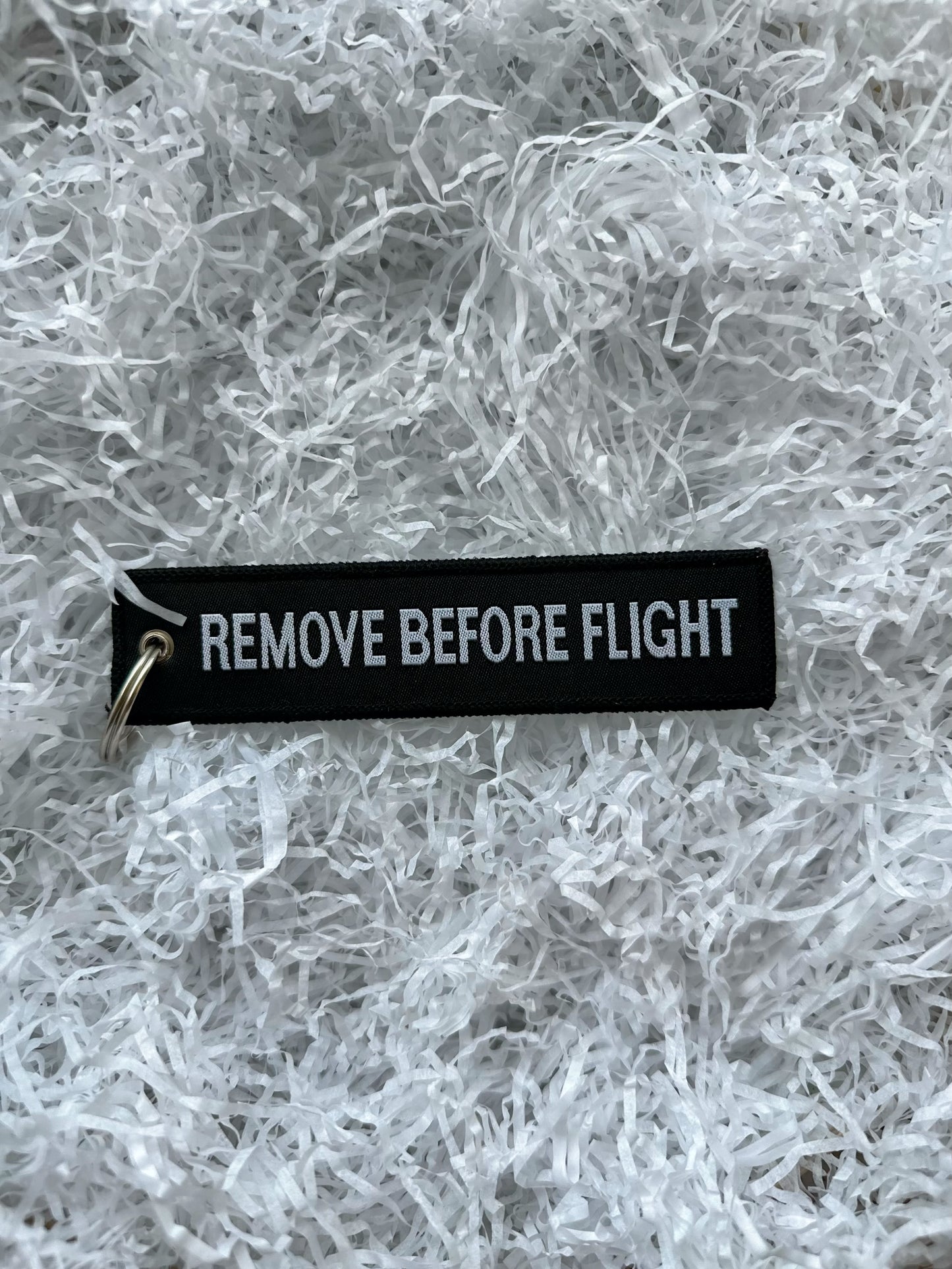 Brelok „remove before flight” czerwony